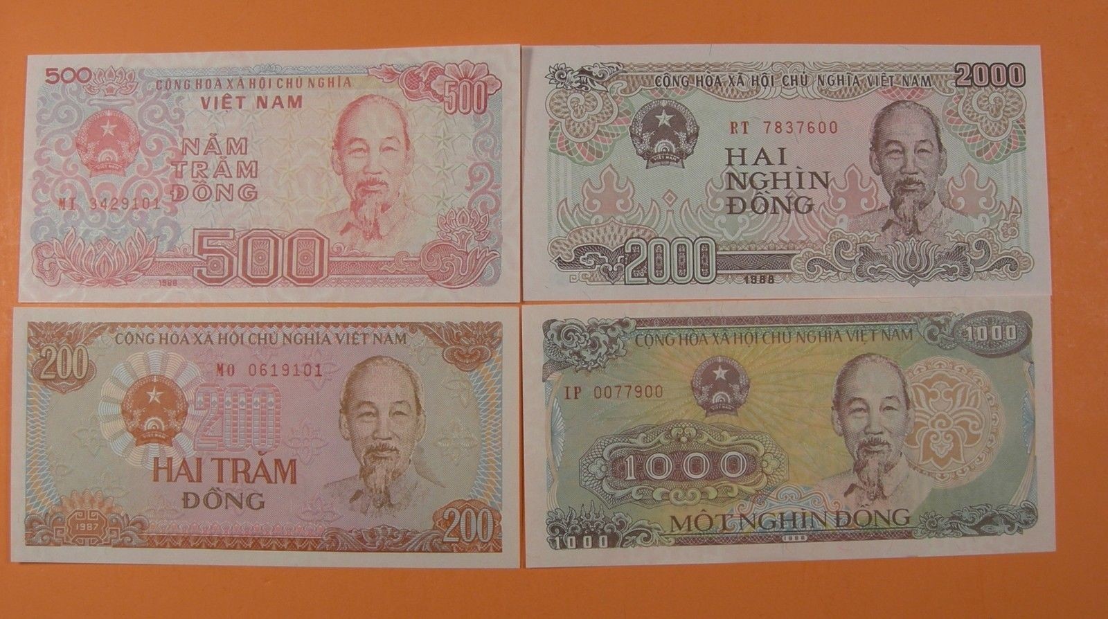 4 COLORFUL VIET NAM NOTES – 200, 500, 1000, AND 2000 DONG – MINT CONDITION