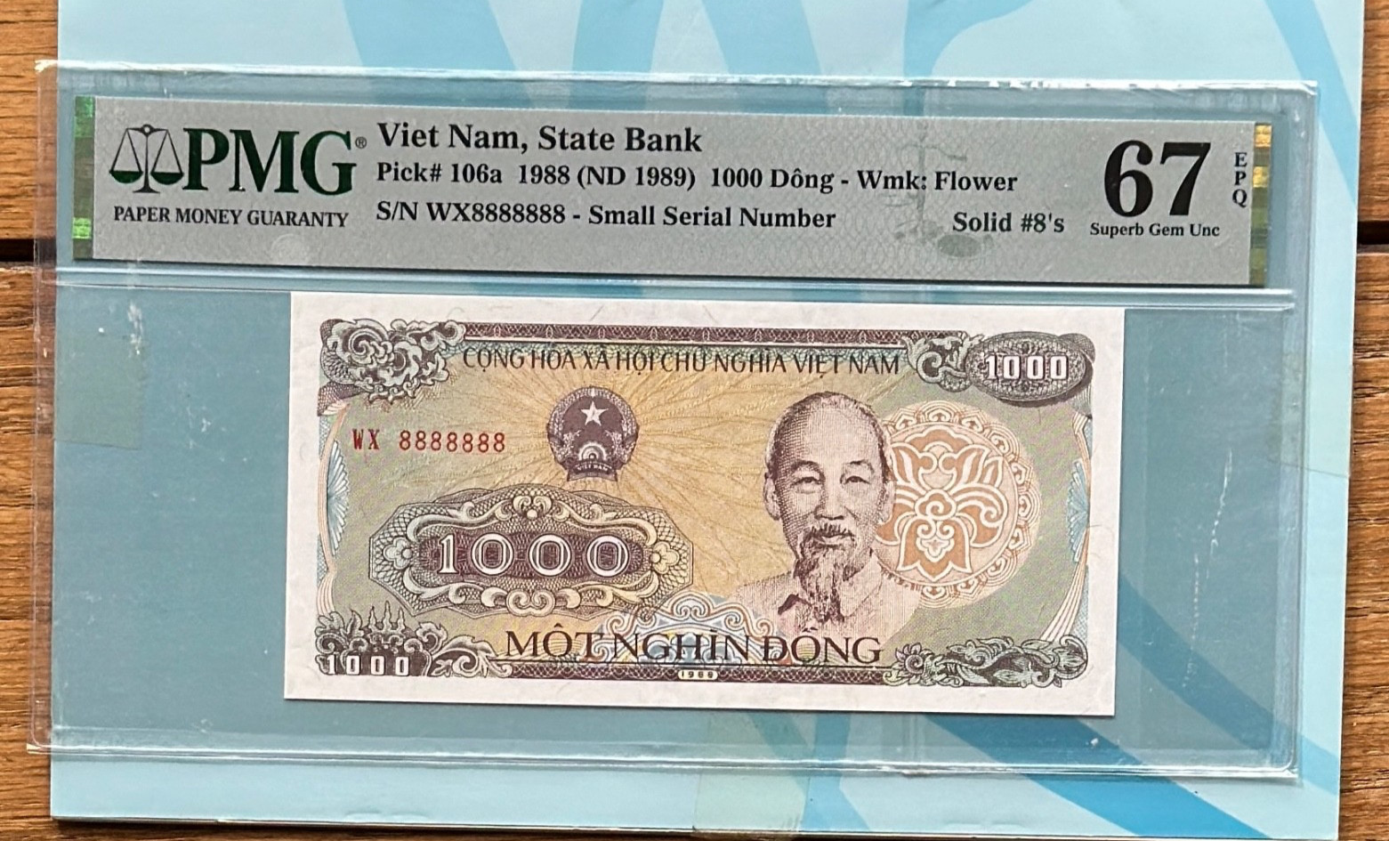 SOLID #8’s PICK 106A VIET NAM 1988 WMK FLOWER 1000 DoNG PMG 67EPQ