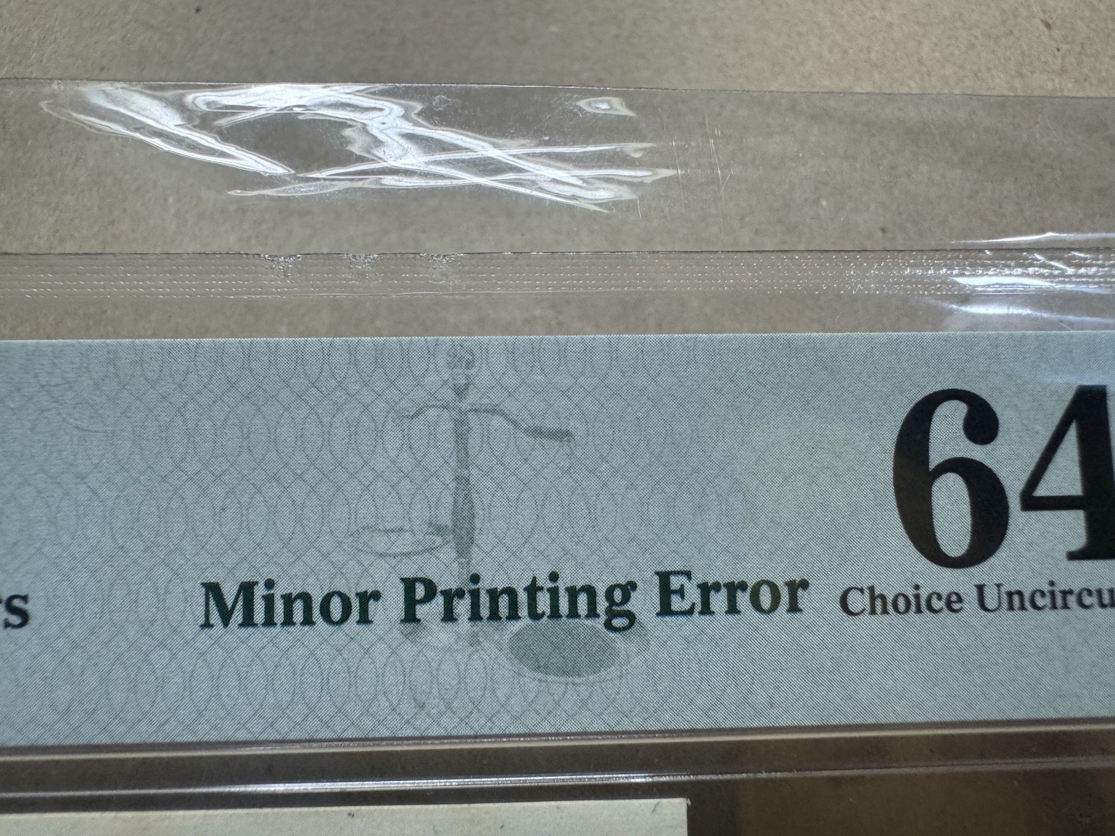 Top Pop Minor Printing Error 1 Đồng 1985 PMG-64 Rare_LDP.