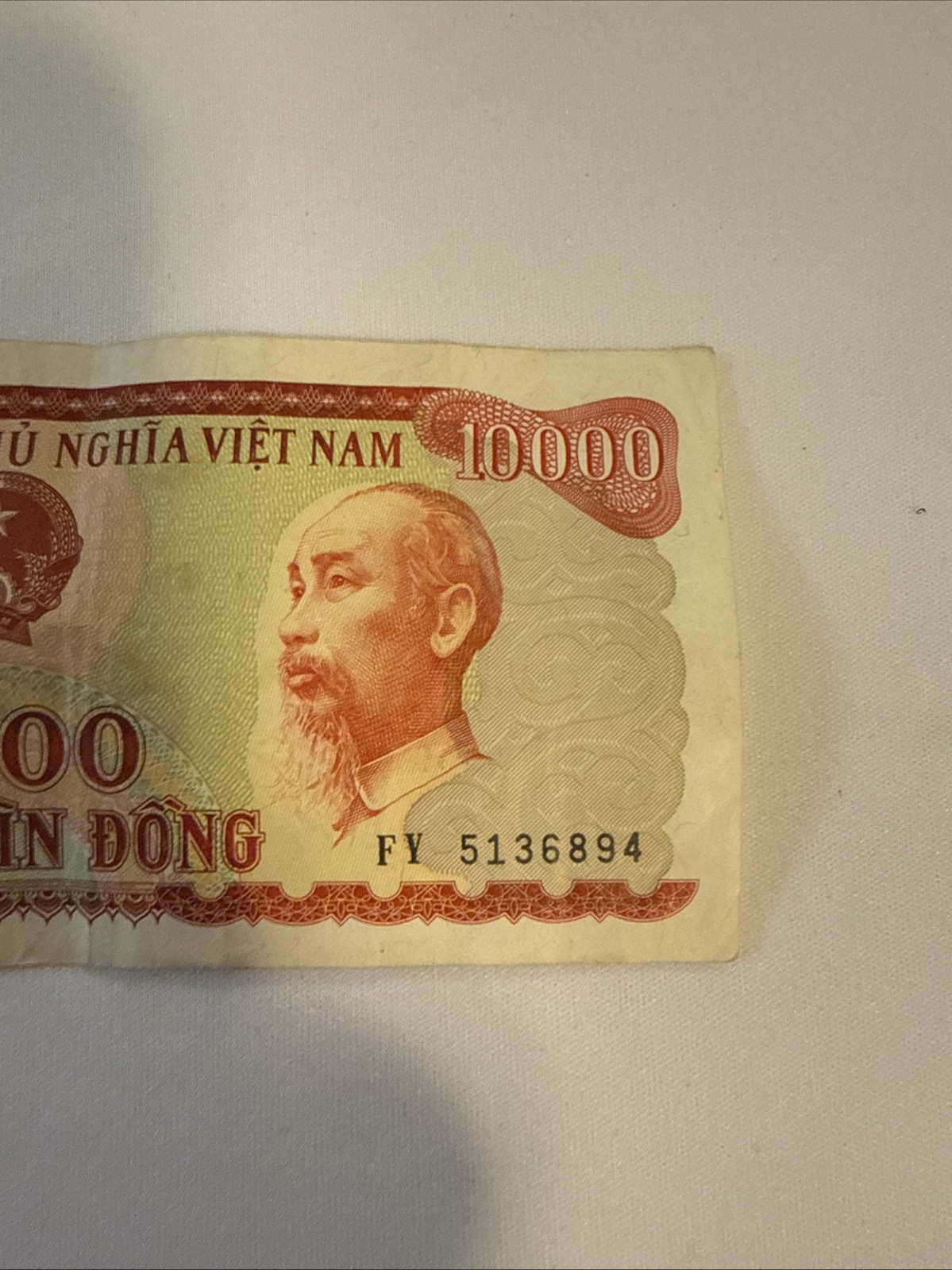 Vietnam (Vietnamese) 10000 (10,000) Dong, 1993 P-109 Ho Chi Minh Stains (Au)
