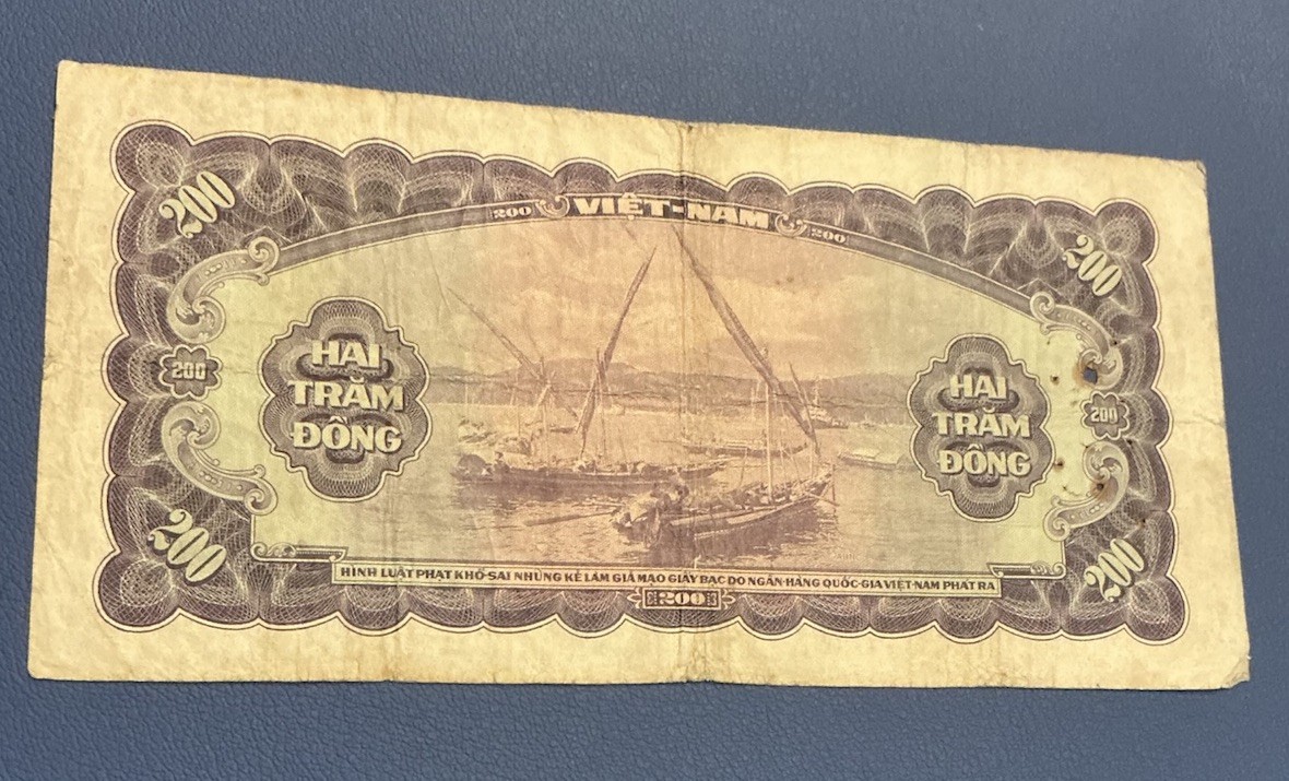 World Paper Money – South Vietnam 200 Dong ND 1958 – Staple Holes